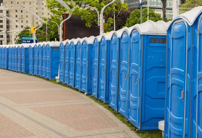 a row of portable restrooms at a fairground, offering visitors a clean and hassle-free experience in East Newark